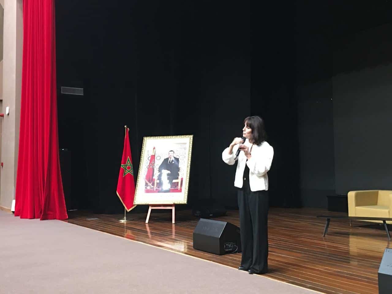 tep-lycee-certificate-ceremony-teresa-cappiali-speaking-morocco-2026 Dr. Teresa M. Cappiali speaking on stage at the certificate ceremony marking the completion of the first TEP pilot at Lycée Mohammed VI d'Excellence, Benguerir, Morocco, March 2026.